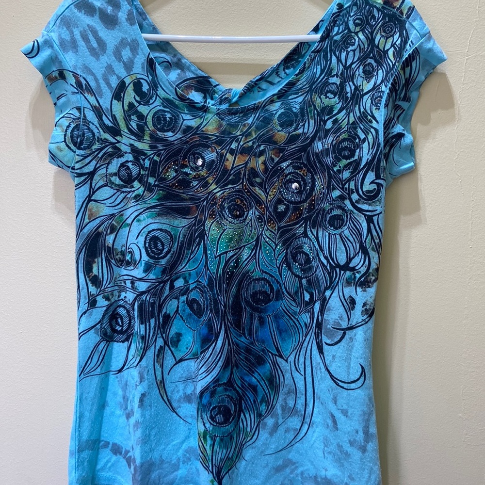 Vibrant blue peacock tee shirt sleeve with twist knot on back neckline S